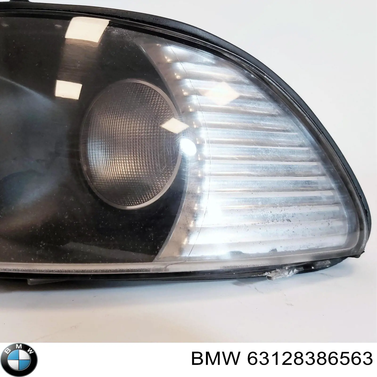 63128386563 BMW faro izquierdo