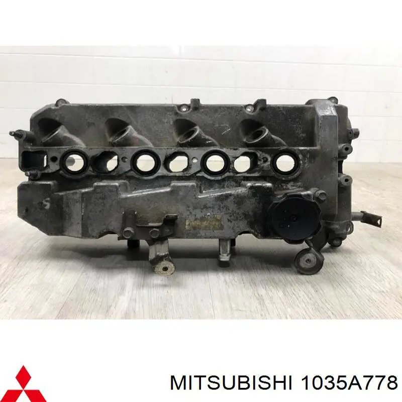 1035A778 Mitsubishi tapa de culata