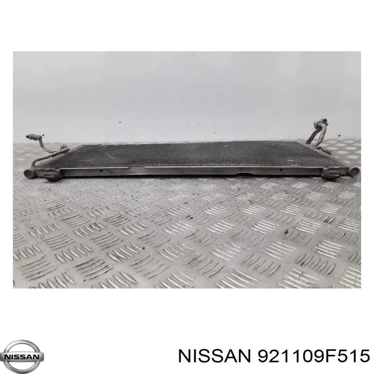 921109F500 Nissan condensador aire acondicionado