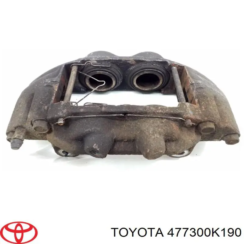 477300K190 Toyota pinza de freno delantera derecha