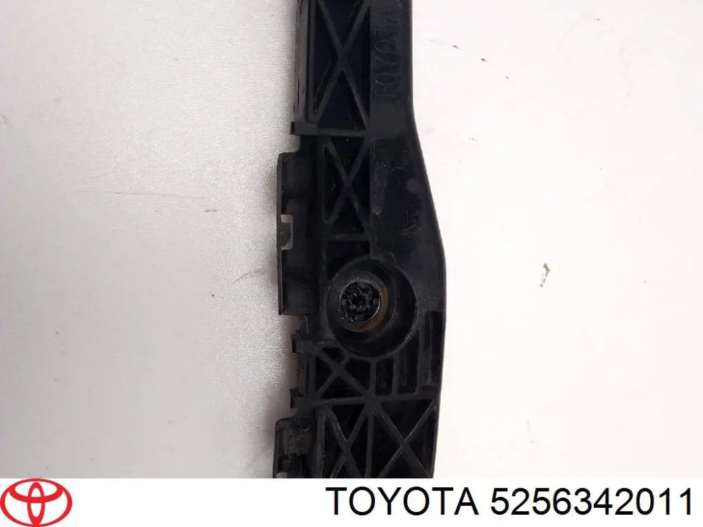 5256342011 Toyota soporte de guía para parachoques trasero, izquierda