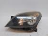 Faros delantero izquierdo 1EG27037001 OPEL