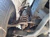 Amortiguador strut delantero 56100EB31D NISSAN