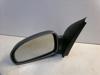 Espejo retrovisor izquierdo 96543120 GM