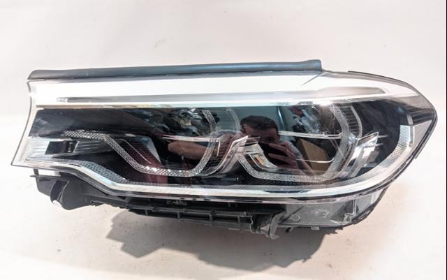 7214961 BMW faro izquierdo