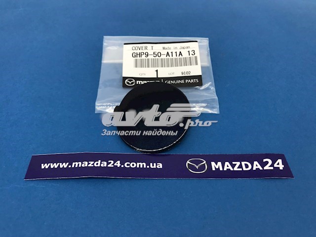 GHP950A11A13 Mazda cobertura de parachoques, enganche de remolque, delantera